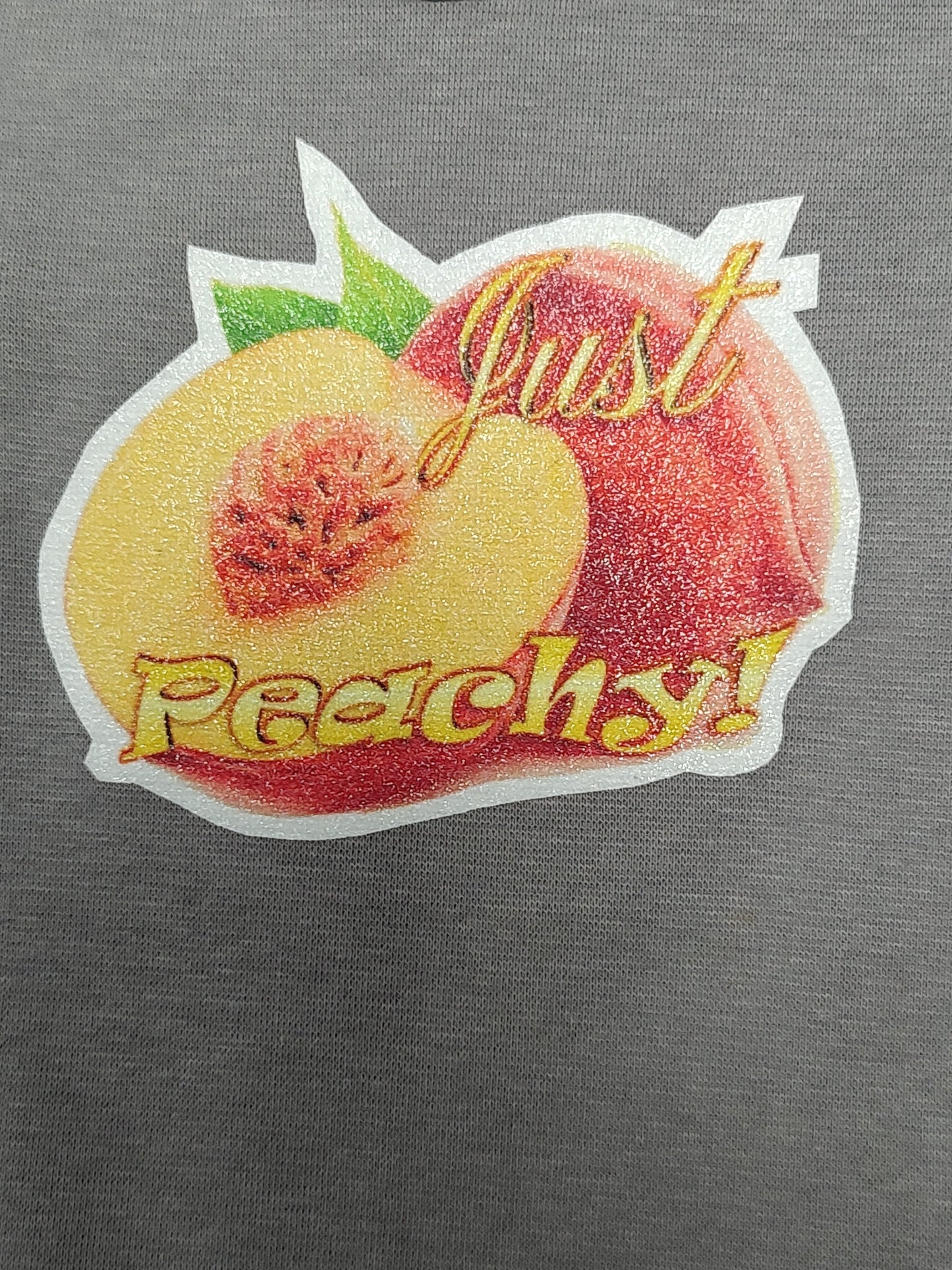 Just Peachy gray baby bodysuit glitter peach hand-pressed  
Fruit themed baby bodysuit gray 12-18 months
www.justsaynpromos.com