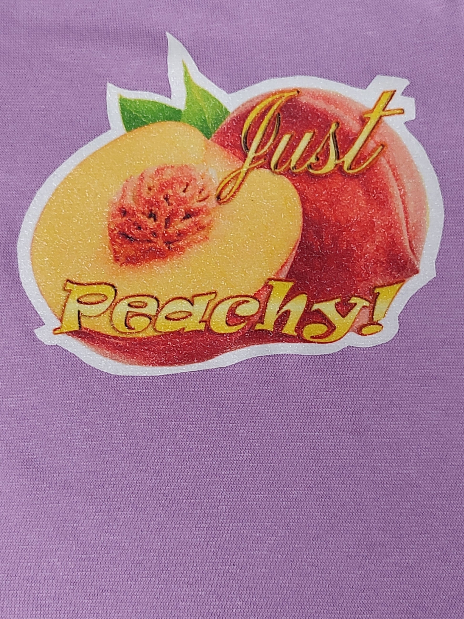 Just Peachy purple baby bodysuit glitter peach graphic hand-pressed  
Glitter-infused purple baby onesie with peach design 12-18 months
www.justsaynpromos.com