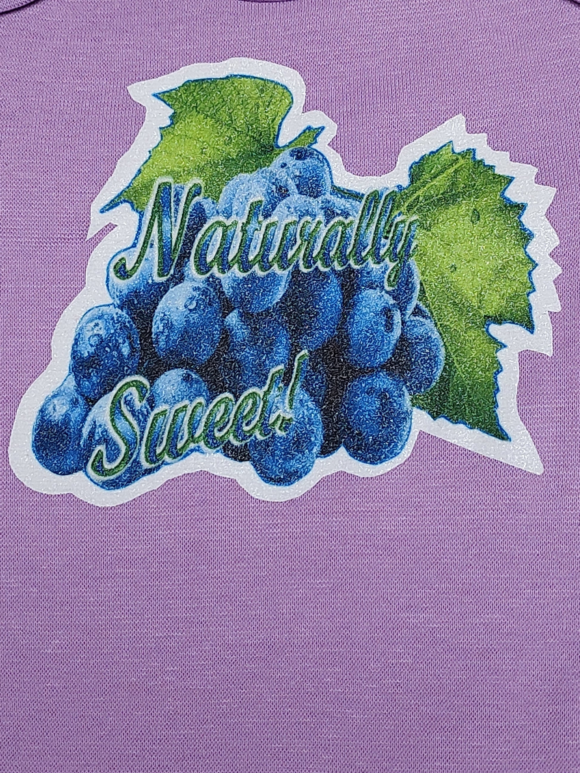 Naturally Sweet light purple baby bodysuit glitter blue grapes hand-pressed  
Purple fruit-themed baby bodysuit 6-12 months
www.justsaynpromos.com