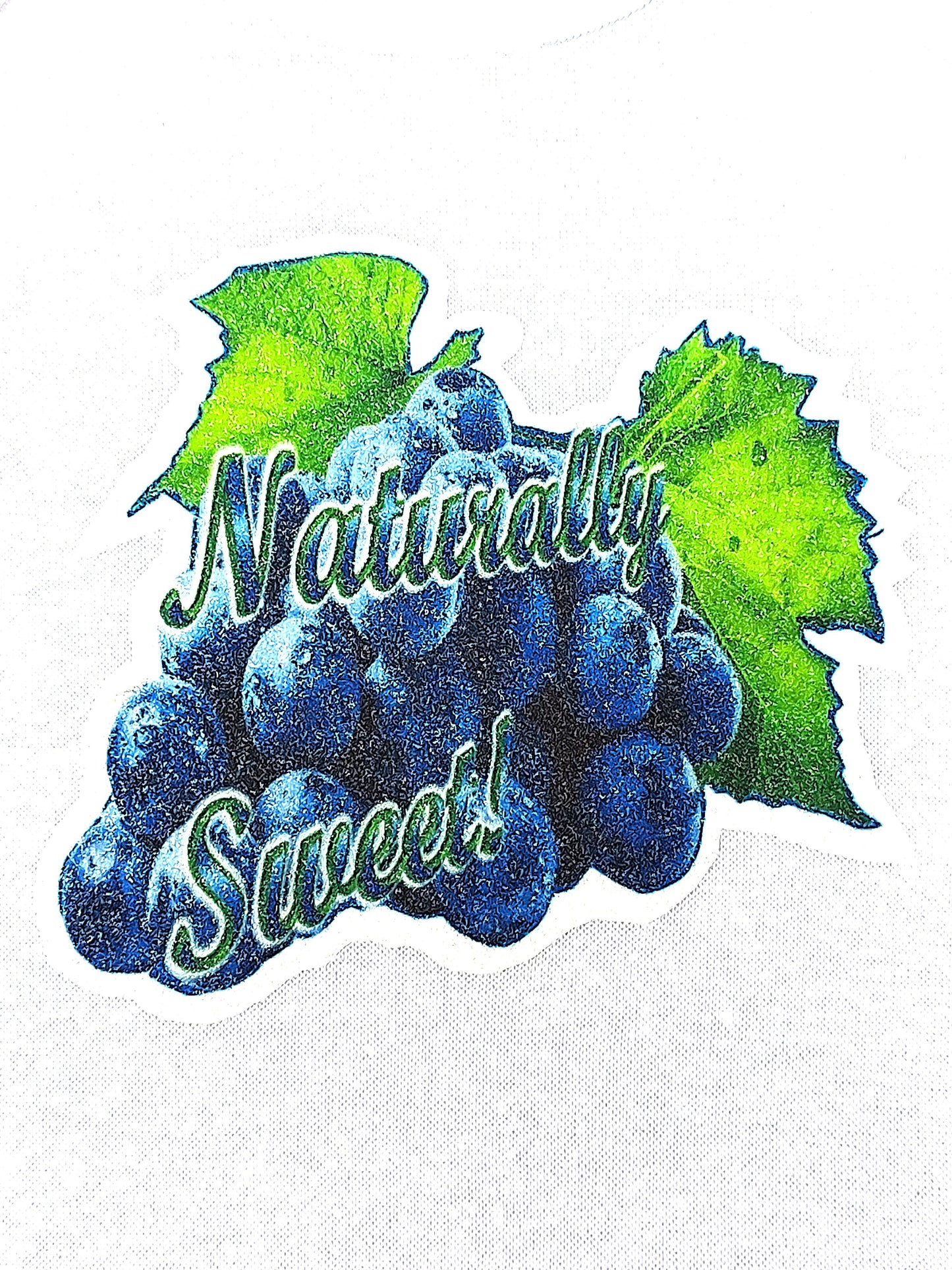 Naturally Sweet white baby bodysuit glitter blue grapes hand-pressed  
White fruit-themed baby romper 6-12 months
www.justsaynpromos.comwww.justsaynpromos.com