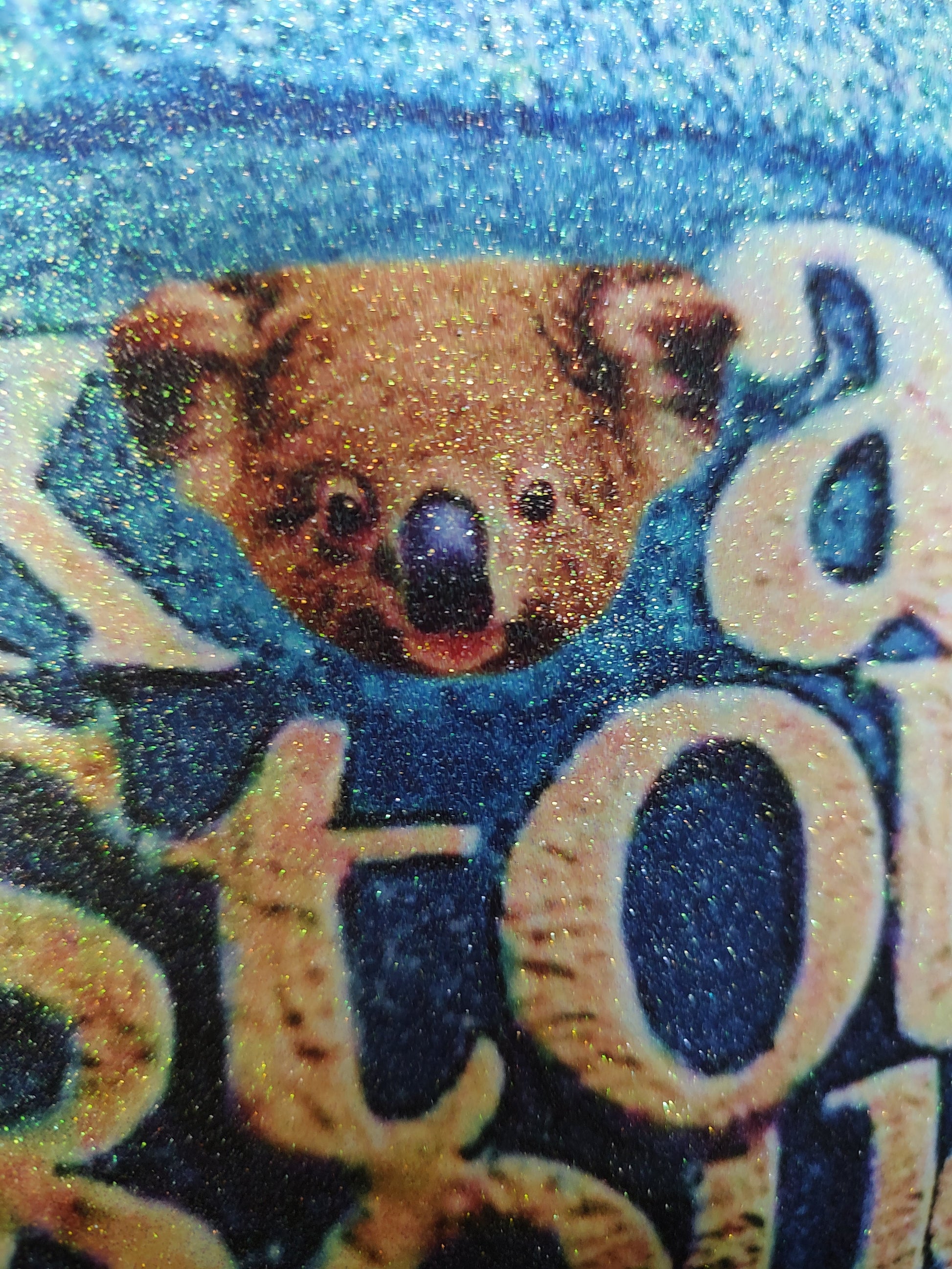 blue koala glitter drawstring bag made from natural cotton

Koala Stout Pouch black cotton pouch with blue glitter koala design

Koala Stout Pouch Blue Image Drawstring Bag Black www.justsaynpromos.com