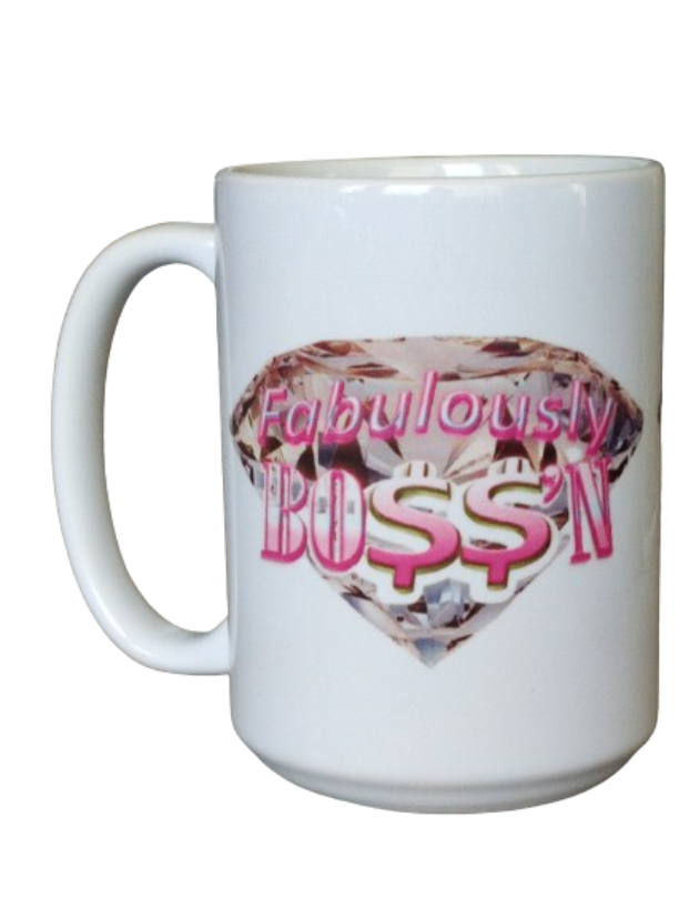 A white 15oz fabulous boss mug displaying a large, brilliant pink diamond design coffee mug. Overlaid on the diamond is the phrase "Fabulously BOSS'N" in vibrant pink, using dollar signs for the 'S's. This boss lady mug is an ideal entrepreneur mug for her and a stylish money sign mug for her.

www.justsaynpromos.com