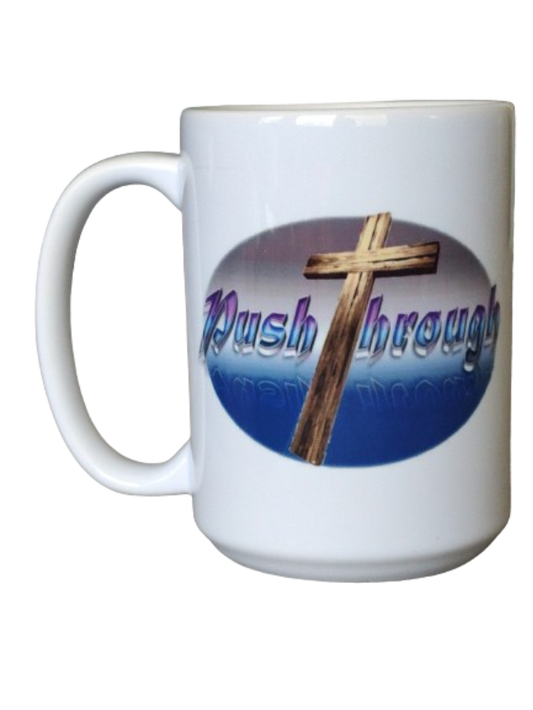 A white 15oz faith coffee mug featuring an oval graphic with a wooden Christian cross against a blue and purple gradient background. The words "Push Through" are boldly displayed in a shimmering purple font next to the cross, making this an inspirational Christian mug and religious mug gift.
www.justsaynpromos.com