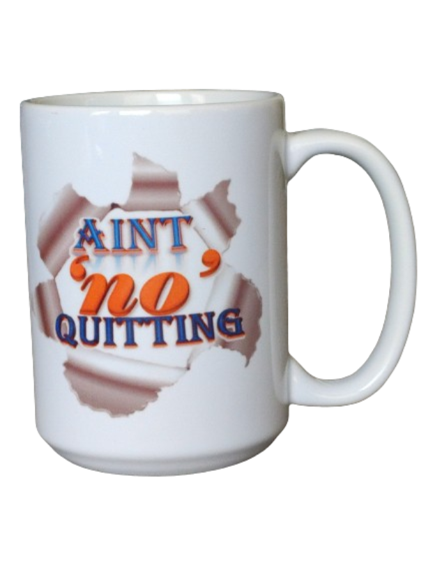 A white 15oz motivational coffee mug featuring a bold graphic of torn paper revealing the phrase "AIN'T NO QUITTING" in blue and orange text. This never give up mug is a perfect inspirational mug gift for someone needing gym motivation or a funny hustle mug for their daily grind.
www.justsaynpromos.com