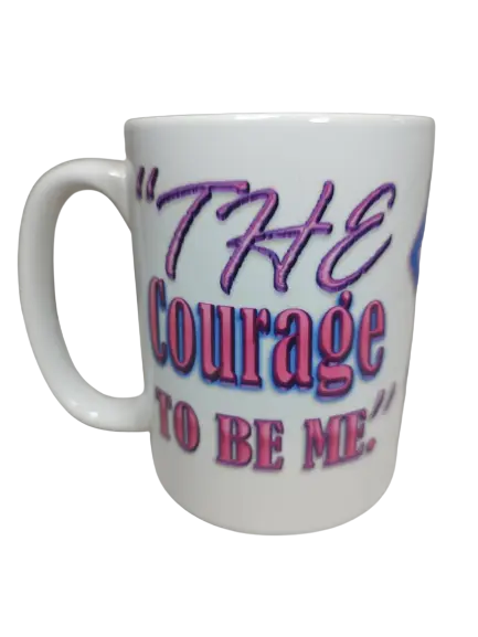 A white 15oz women empowerment mug with a prominent blue female silhouette mug in the center, outlined in pink. To the left and right, parts of the phrase "THE COURAGE TO BE ME" are visible in bold pink and purple letters. This motivational mug for her is a powerful inspirational mug for women.
www.justsaynpromos.com